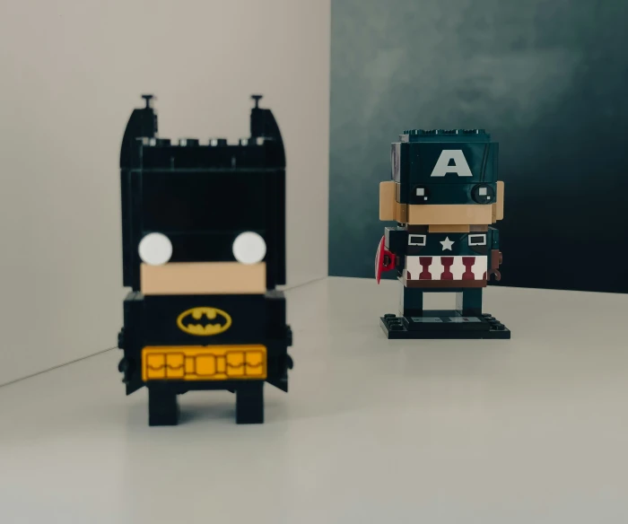 two lego figures of batman, a bat, a joker and a dracula