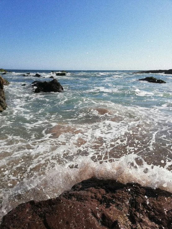 an image of a rocky beach in the ocean