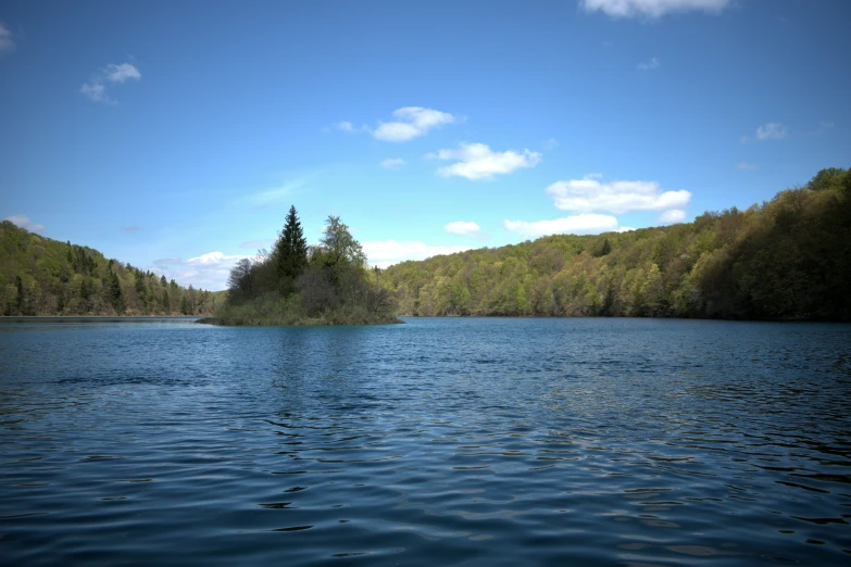 the body of water has blue and green water