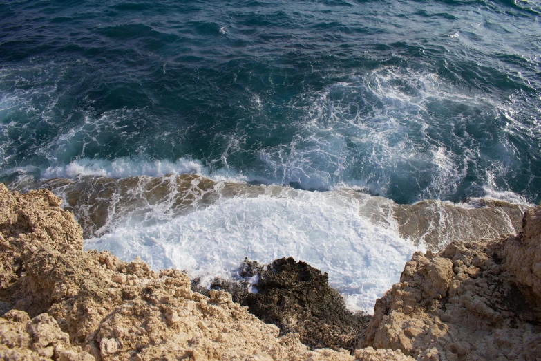 a large amount of water near a rock area