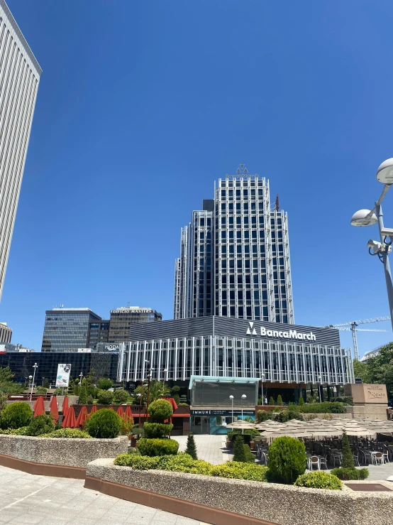 a large tall building towering above the city