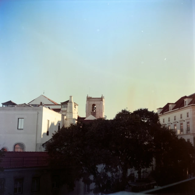 many buildings with spires in the back ground