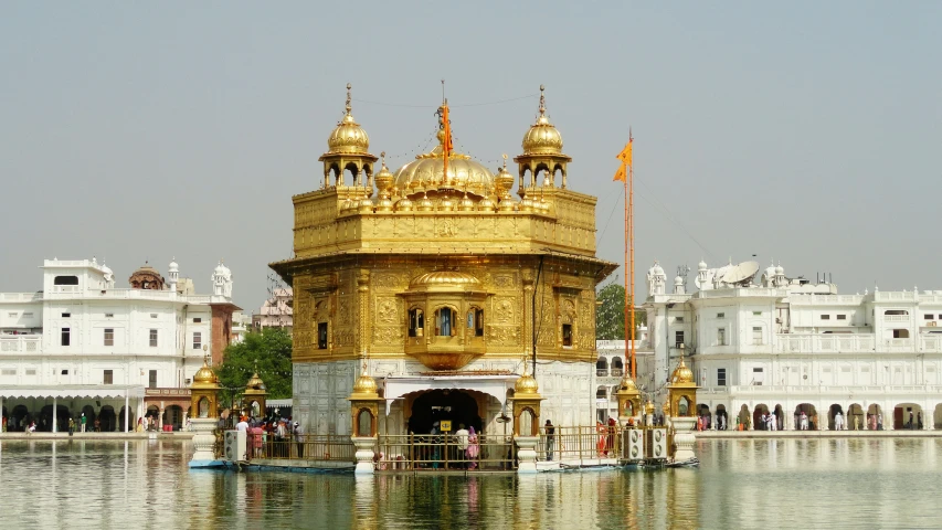 a golden building with several tall spires