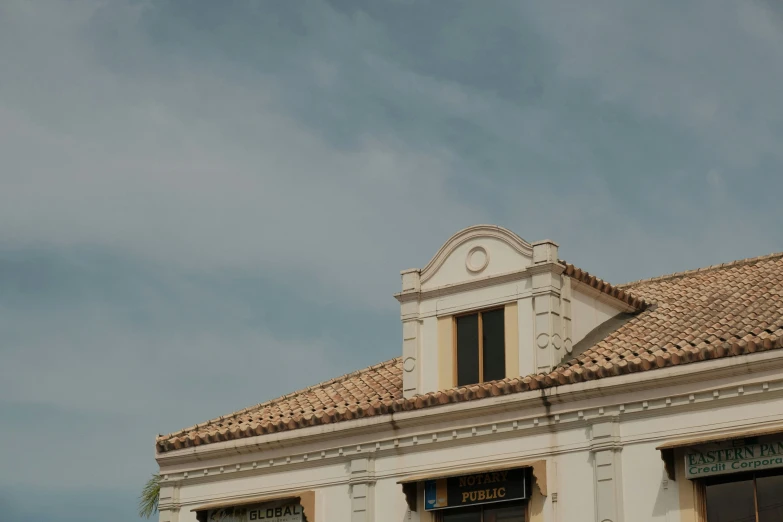 a clock is on top of an old building