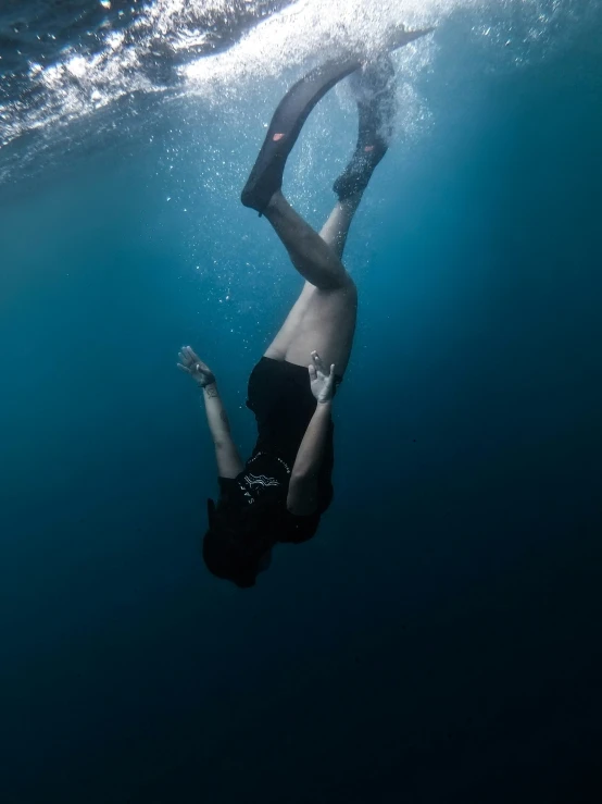 the man has  on while diving under the water