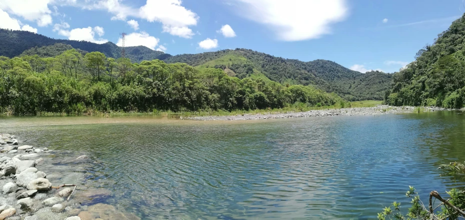 an image of a mountain scene with water