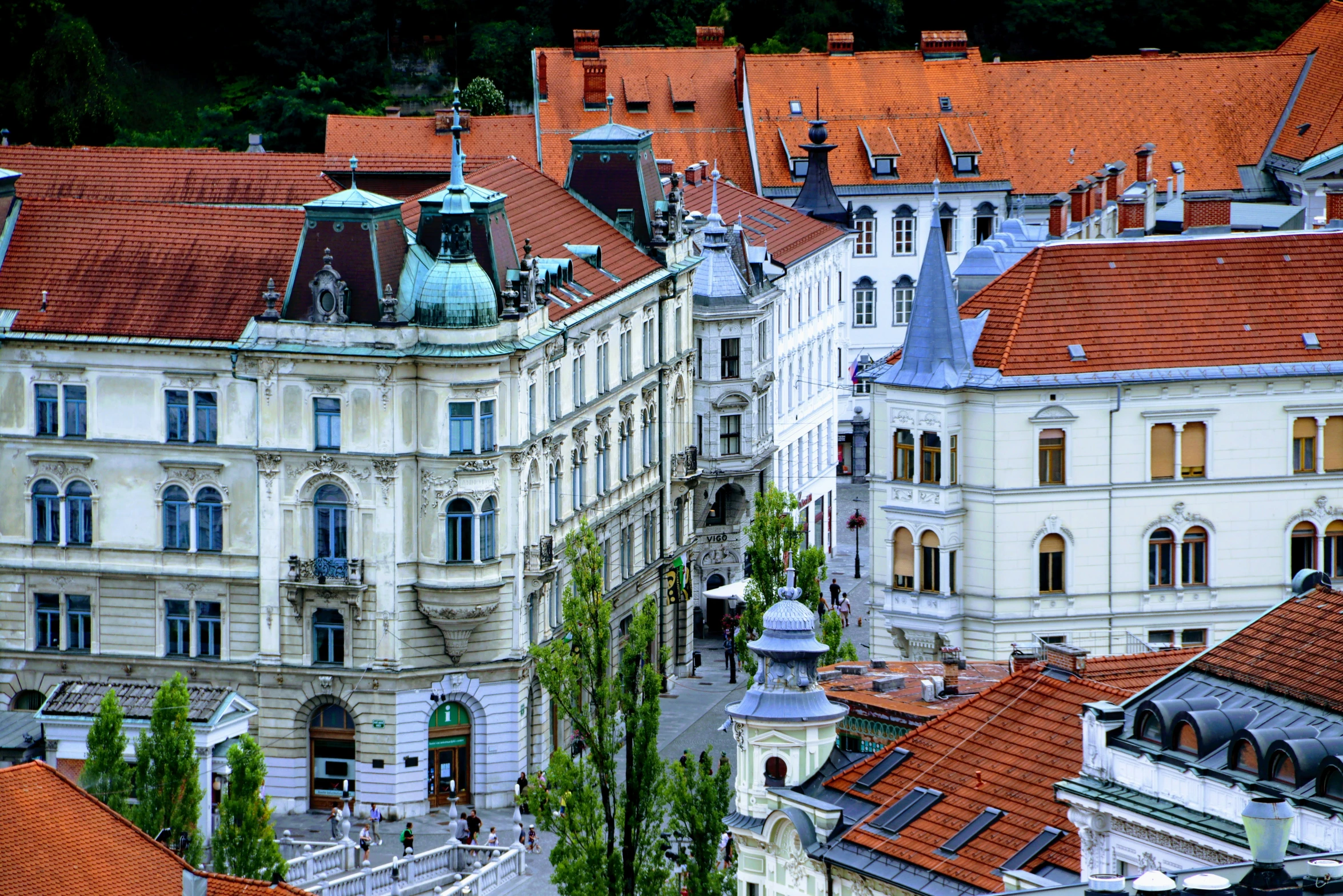 an ornate old town is seen on the top