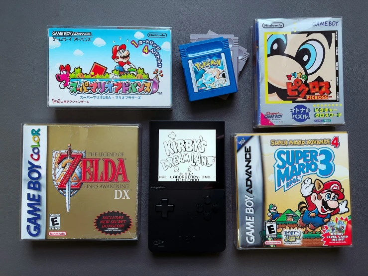 a nintendo gameboy, gameboy color, and video game