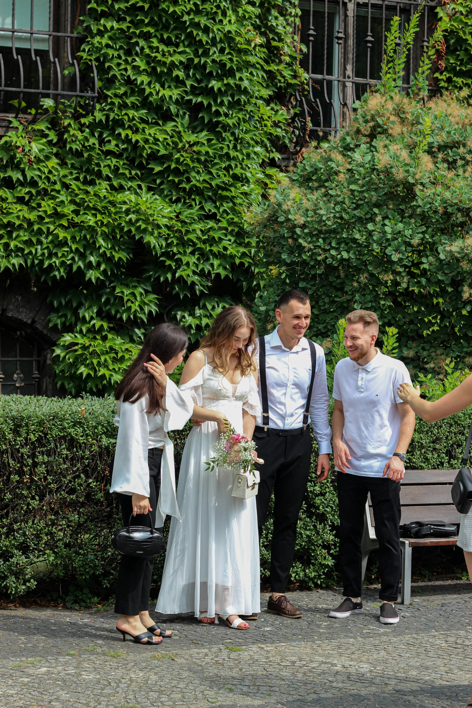 an image of the wedding party at the park