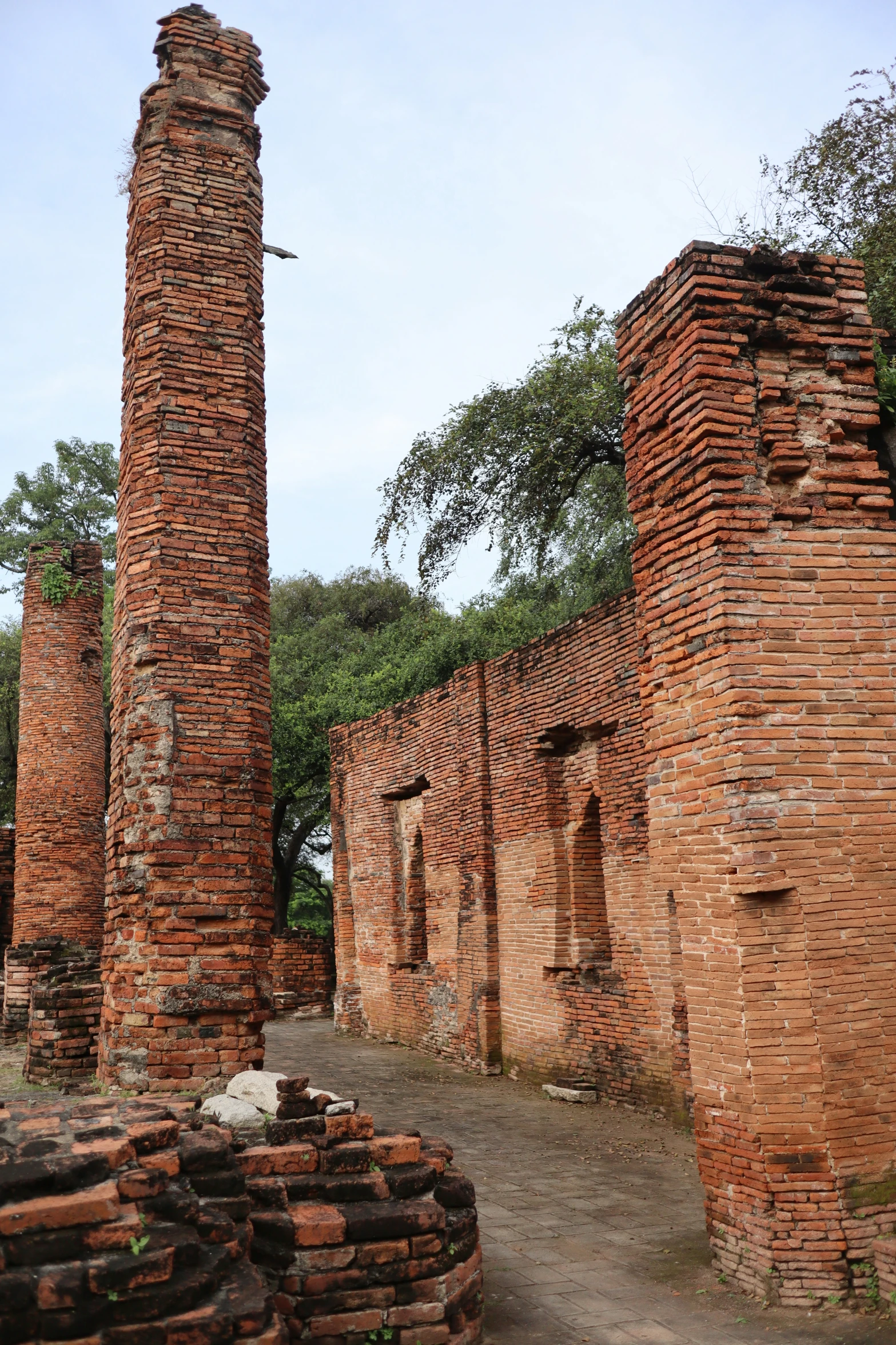 brick structures at an old building with a brick street