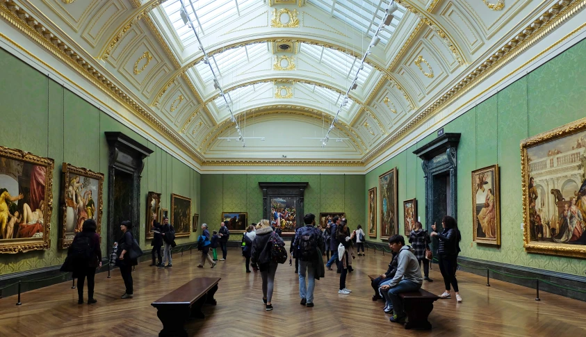 a very big room with some paintings on it