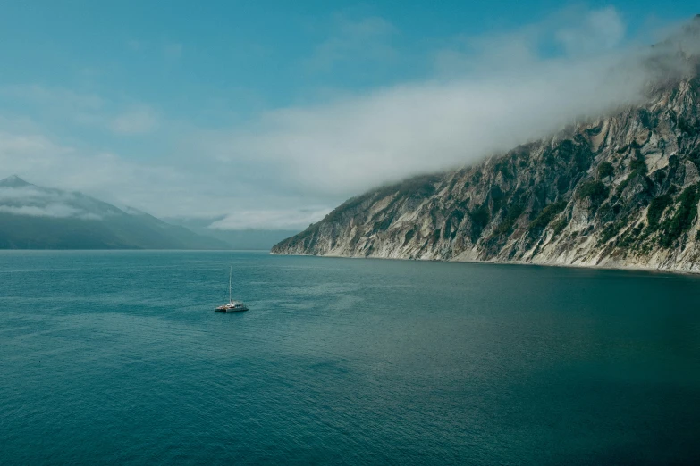 a boat floating in a large body of water