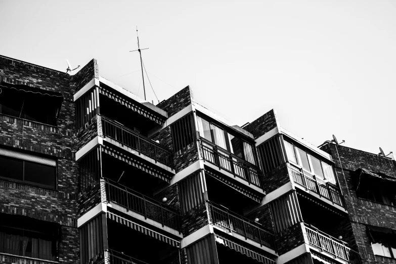 a tall building with balconies and balconies