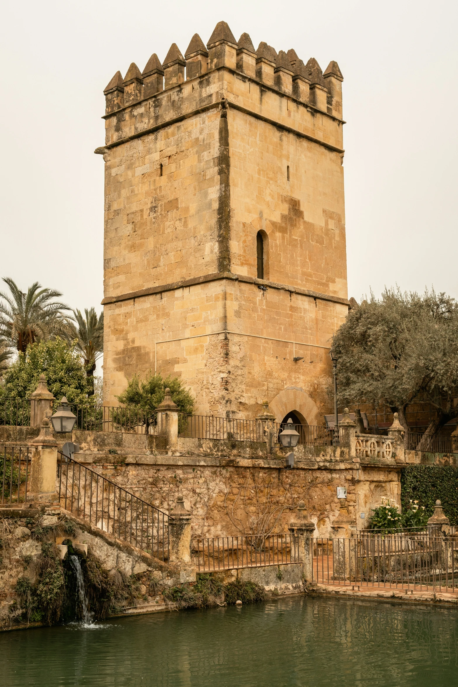 a large tower sitting above the water