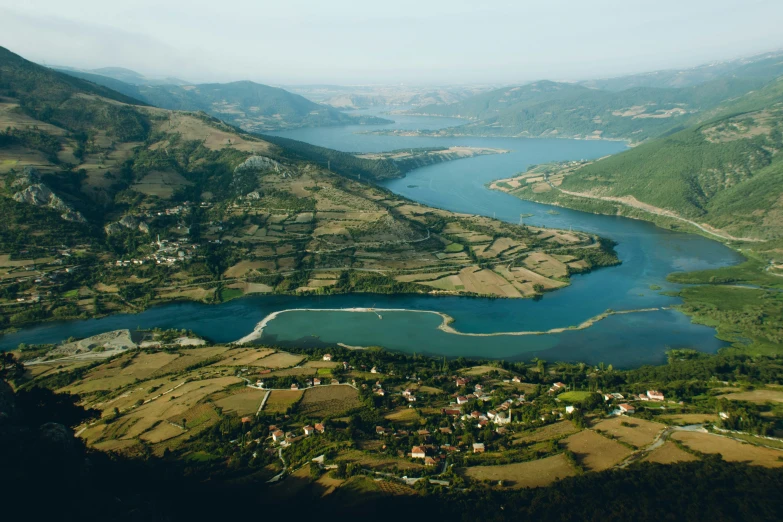 this is a picture taken from the air with mountains in the background