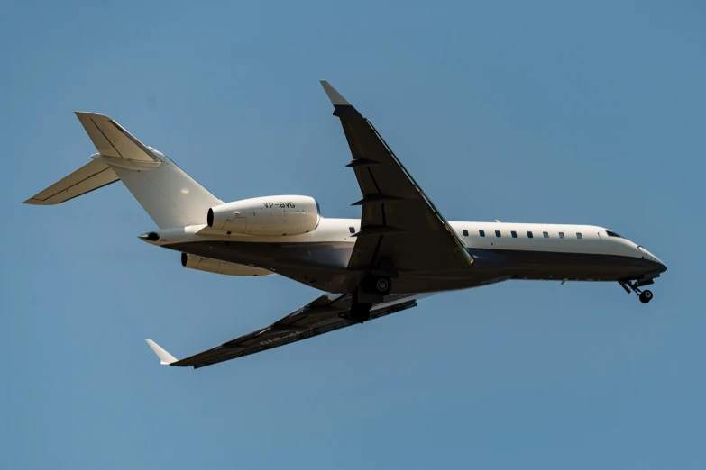 a small passenger plane flying in the sky