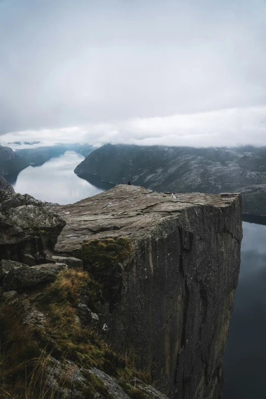 a long canyon with a river flowing between it