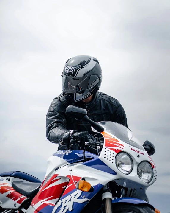 a man is riding on top of a motorcycle