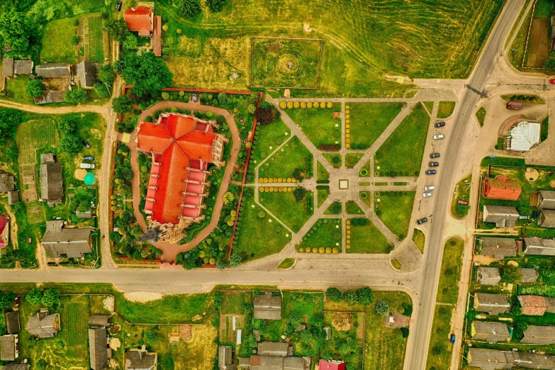 an aerial view shows houses, streets and roads