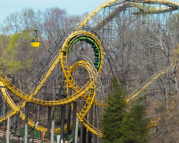 the roller coaster at the amut park is yellow