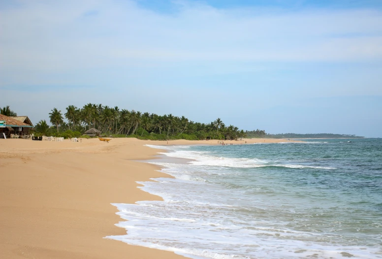 the shoreline on a tropical island is calm