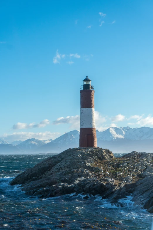 the light house is located at the top of the rock