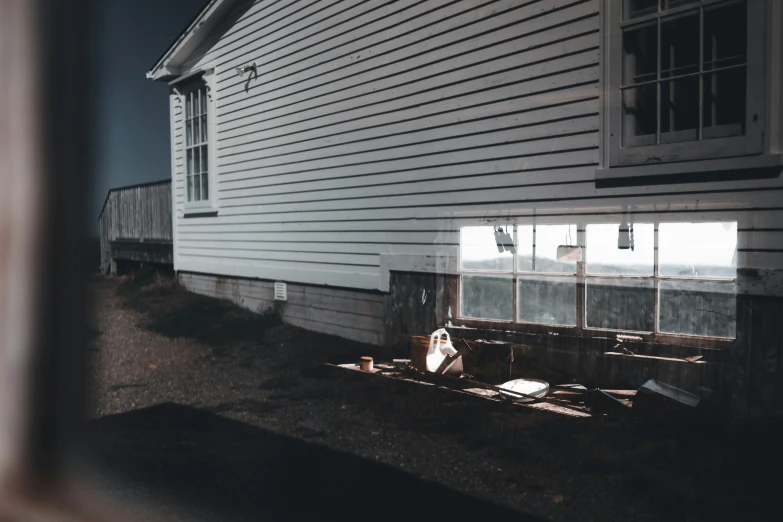 the side of a house next to a window