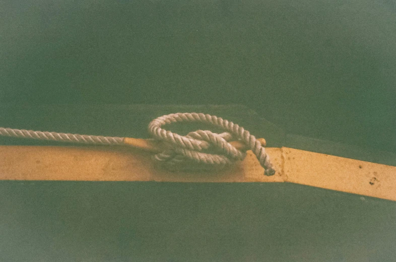 there is a rope that has been placed on the edge of a boat