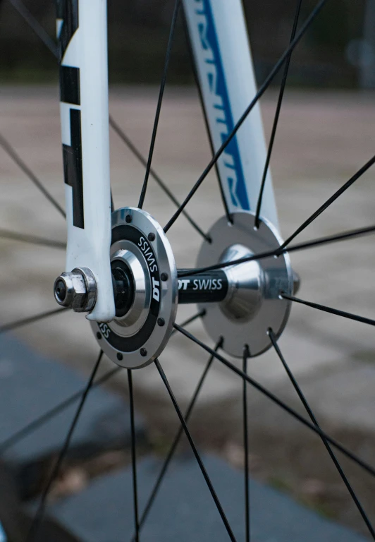 a close up of the spokes on a bike