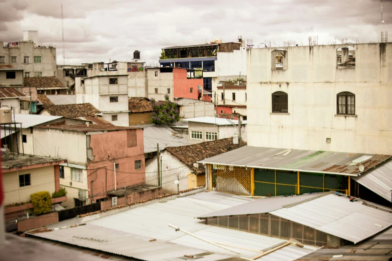 rooftops and old buildings against an overcast sky