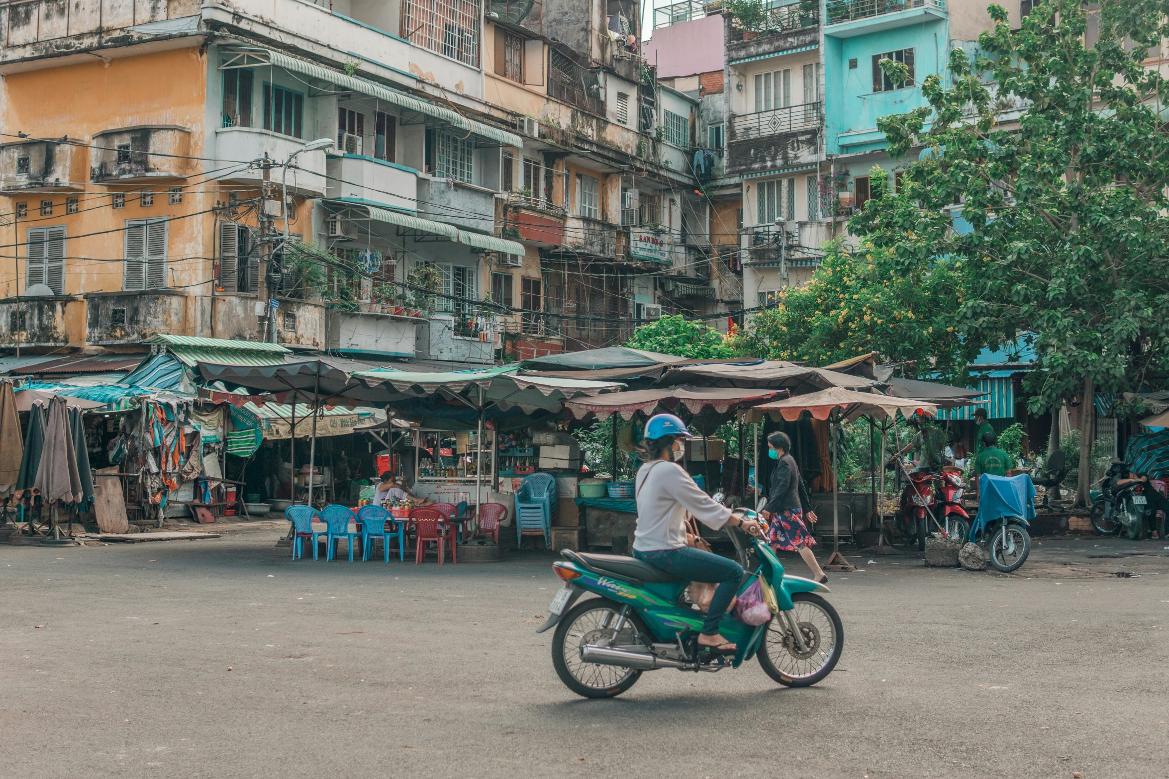 a man on his motorcycle is going down the road