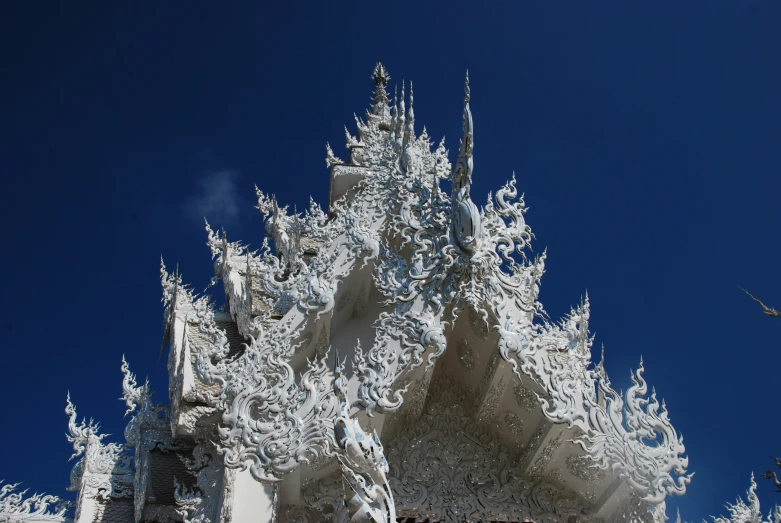 a snowy scene of a tall tower structure