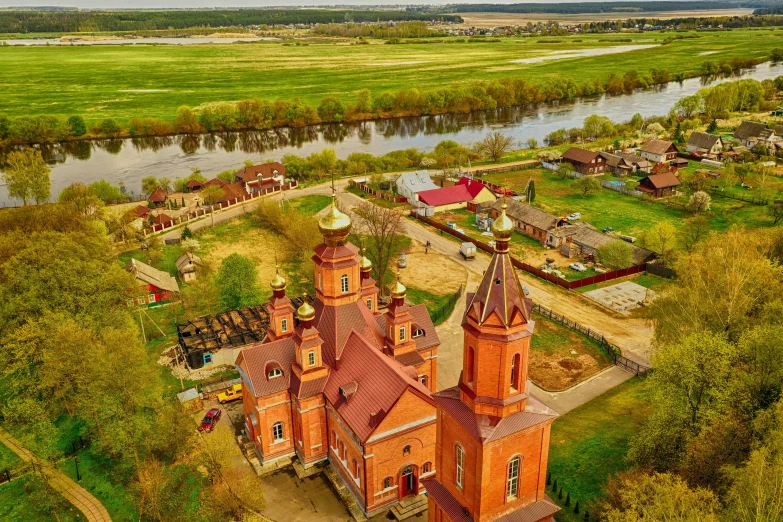 a large building that is next to a river