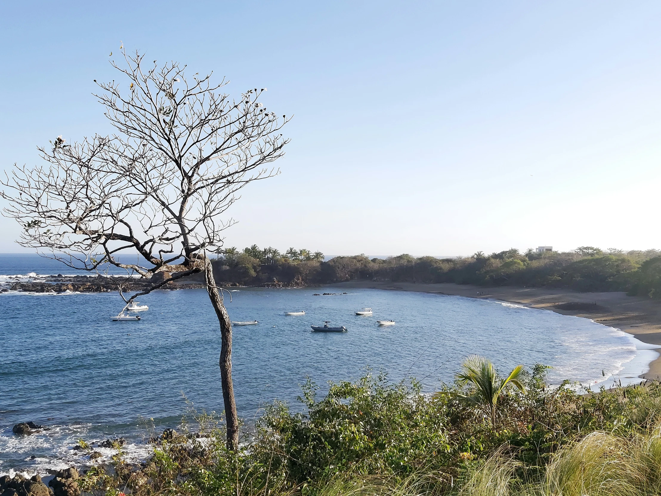 an overview of the beach and ocean along the coast