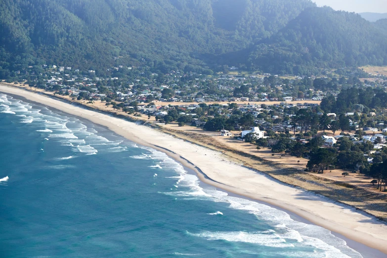 a picture of the beach and coastline from above