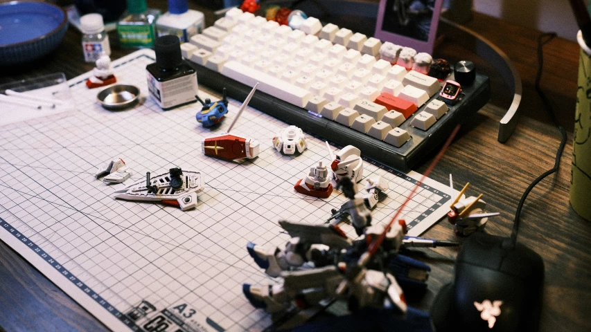 the toy space shuttles are scattered by their model keyboards