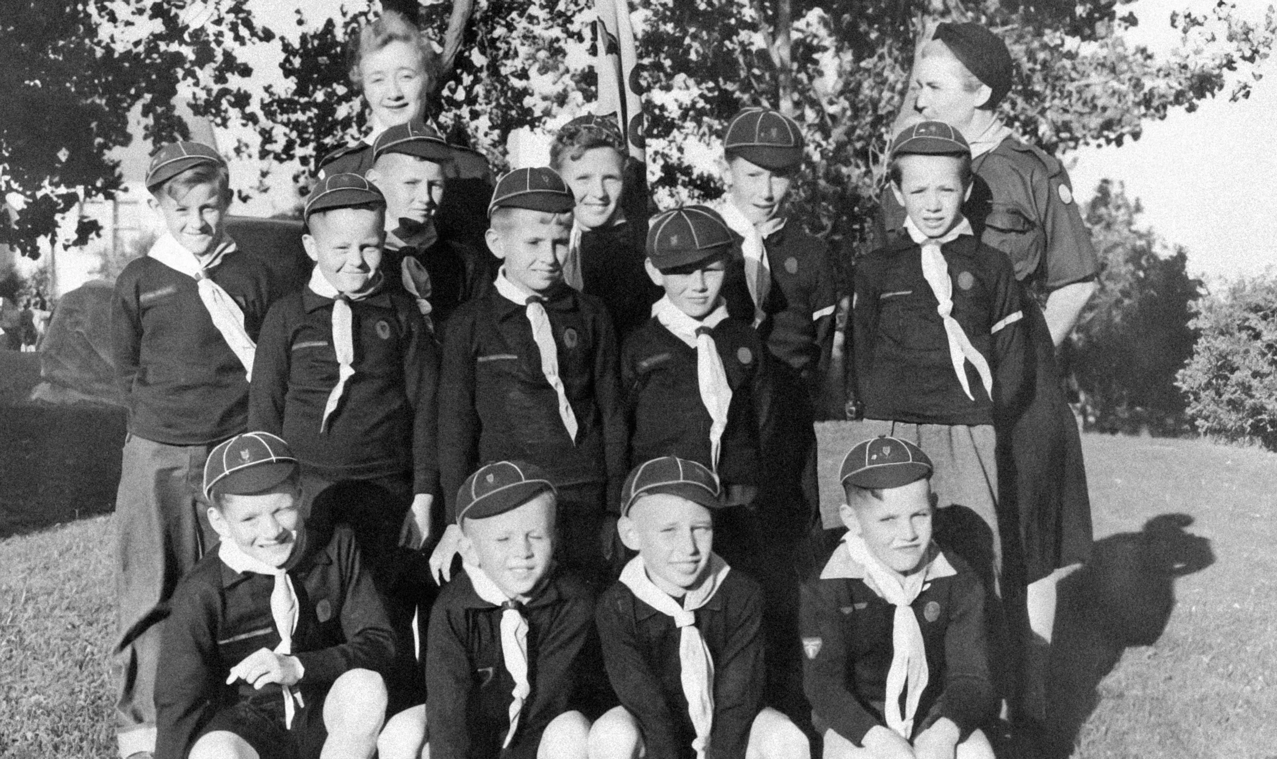 this vintage black and white po shows children in uniforms