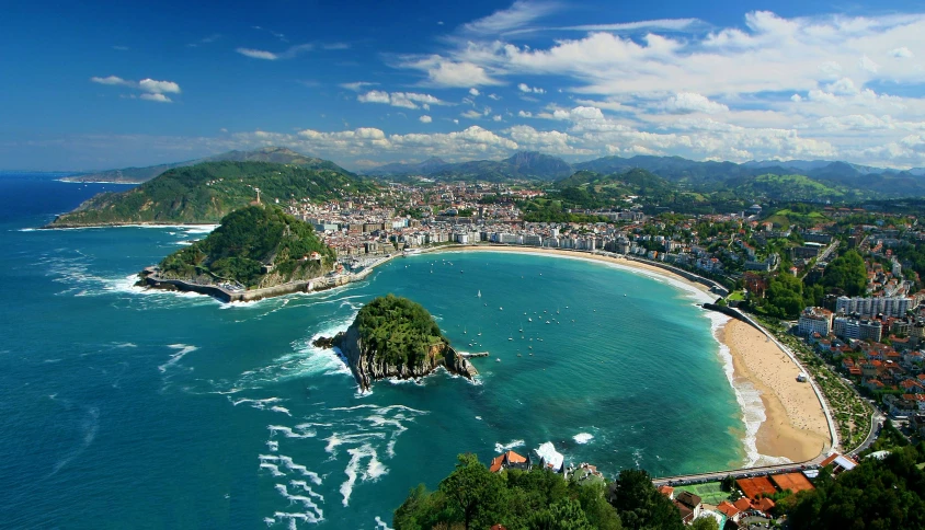 a view of a city and beach from above