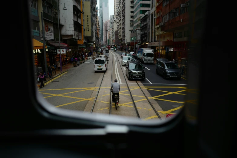 an aerial view of people riding bikes in the city