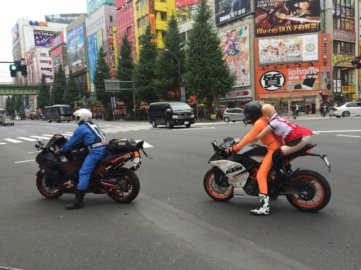 there is a motorcycle race going on in the middle of the street