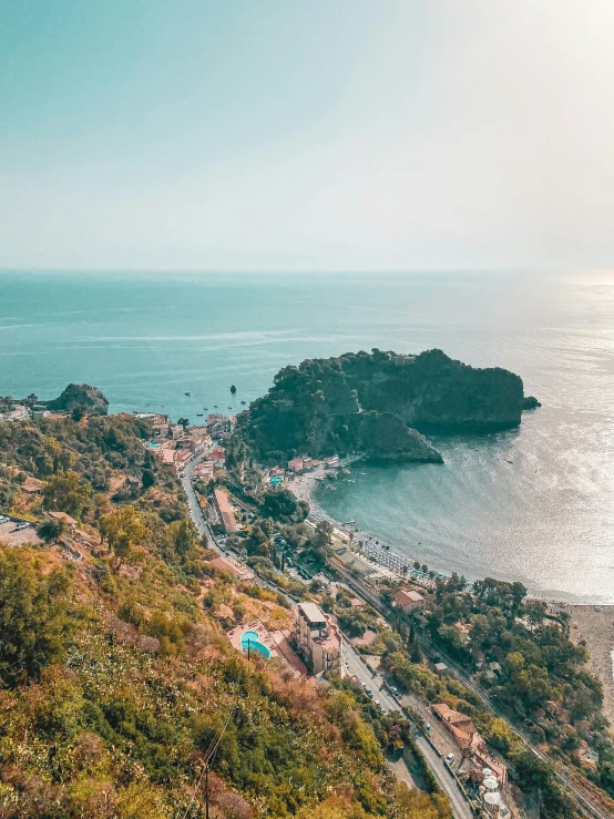 a scenic view of the ocean with some boats in it