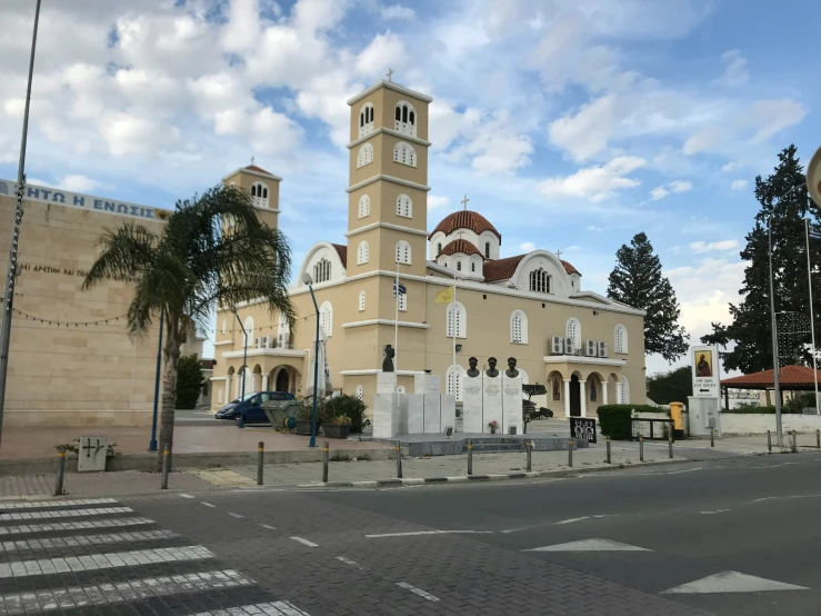 a large church in a city by the street