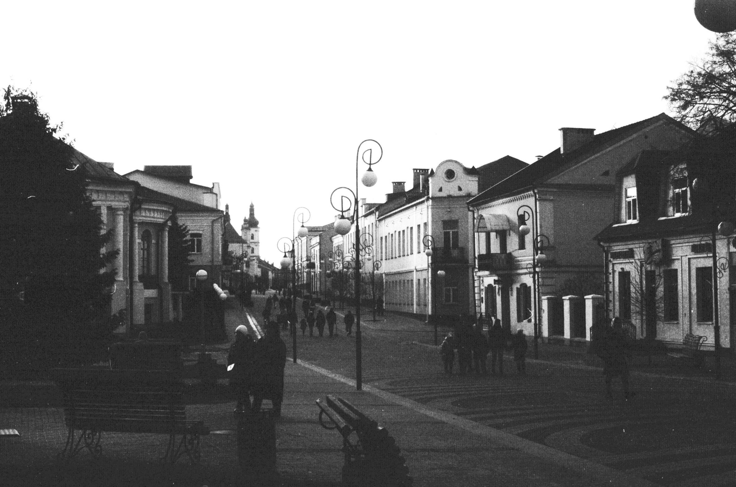 black and white pograph of the streets in an old country town