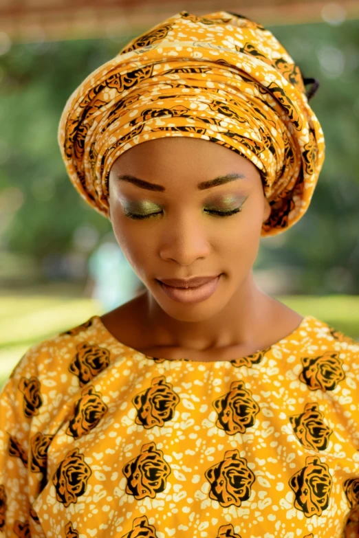 a woman wearing a yellow and black dress