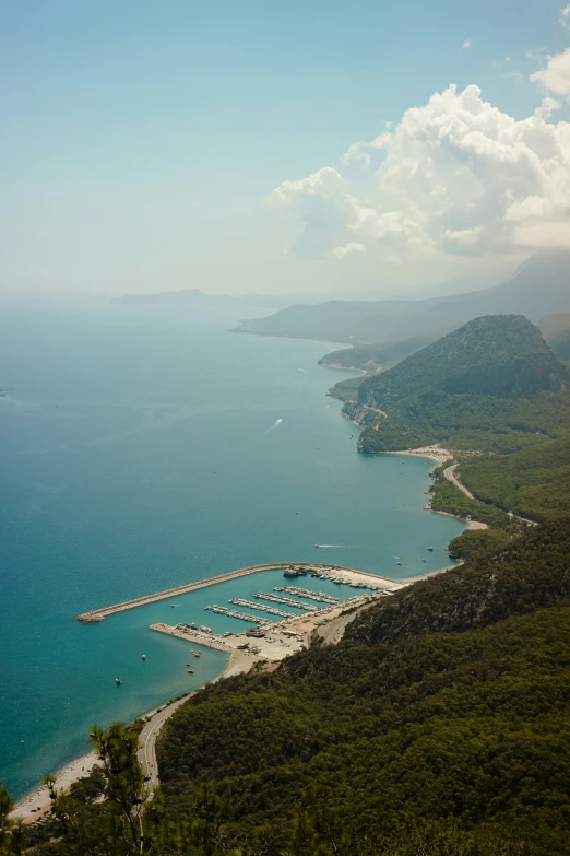 an aerial view of a harbor in the middle of the ocean