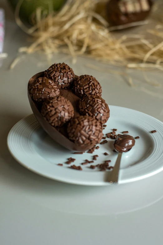 a chocolate cake shaped like a heart and dipped in chocolate