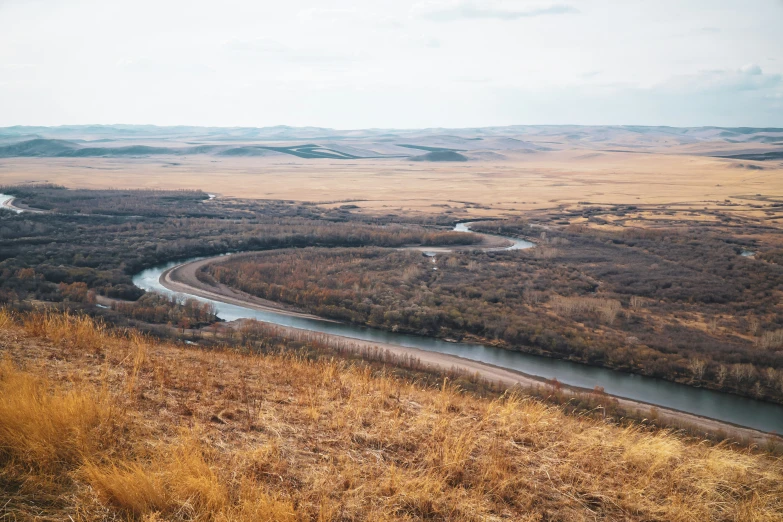 there is a river in the middle of an open field