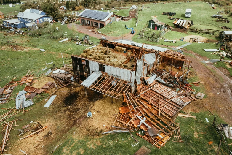 an aerial view of a destroyed out house