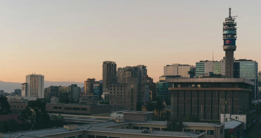 a skyline of skyscrs with buildings in the foreground