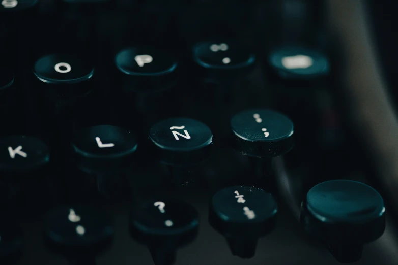 an old typewriter has been modified into a dark background